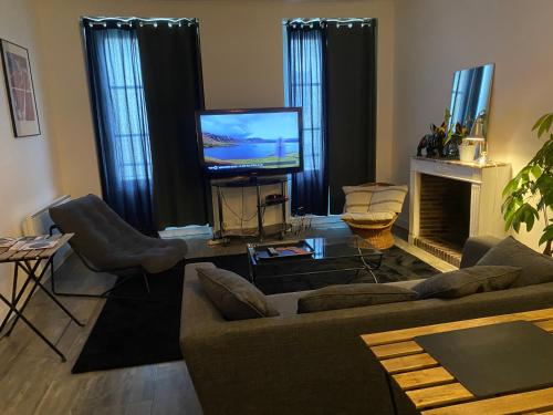 Телевизор и/или развлекательный центр в Studio Plein Centre