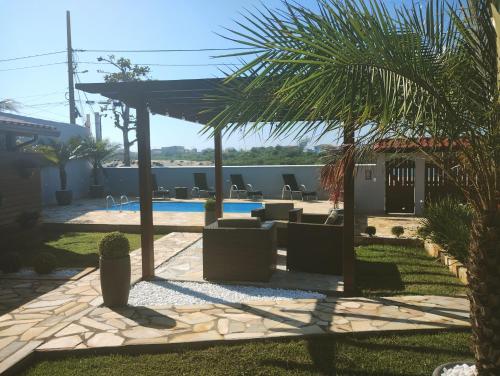 Bazén v ubytování Aconchegante pé na lagoa nebo v jeho okolí