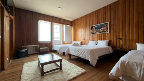 Postel nebo postele na pokoji v ubytování Travels Hotel