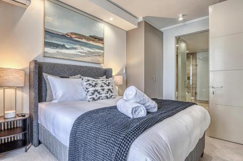 En eller flere senge i et værelse på Belle Vue at Ellipse