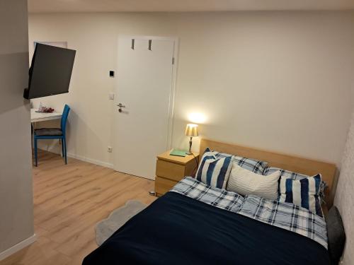 Кровать или кровати в номере Wolfs Studio