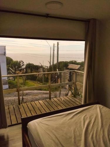 Ένα ή περισσότερα κρεβάτια σε δωμάτιο στο Cabañas La Boca 2