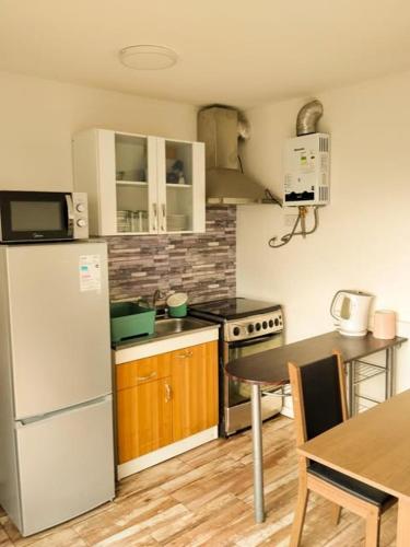 Η κουζίνα ή μικρή κουζίνα στο Cabañas La Boca 2