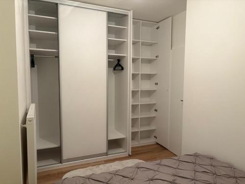 Ένα ή περισσότερα κρεβάτια σε δωμάτιο στο Riverside Vrchlabí