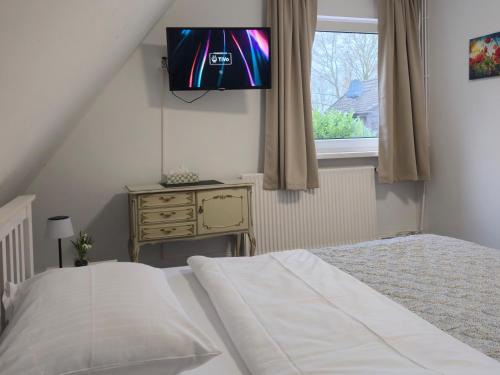 Cama o camas de una habitación en Gästehaus Bergedorf 1