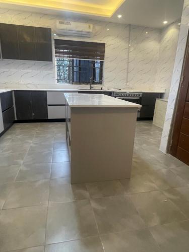 Kuchyň nebo kuchyňský kout v ubytování NickJaak courtyard- 1-4 bedrooms