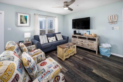 Et tv og/eller underholdning på Sunset Cottages 4C Pet friendly condo