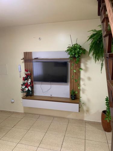 Et tv og/eller underholdning på Apto 13 - Residencial Canaã