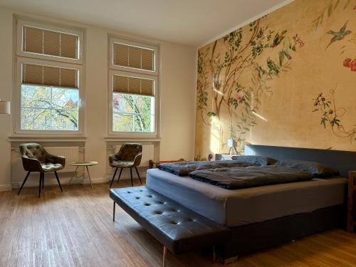 Postel nebo postele na pokoji v ubytování Villa am Wall - Altstadt City