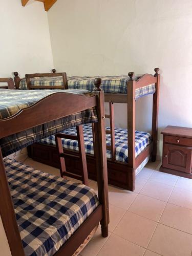 En eller flere senge i et værelse på La Lucila del Mar Duplex