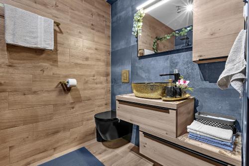 Et badeværelse på Apartman Aria De Lux