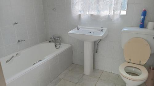 Et badeværelse på SashMc Flair Guesthouse