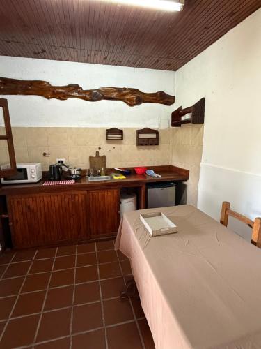 Küche/Küchenzeile in der Unterkunft Cabañas La Cautiva