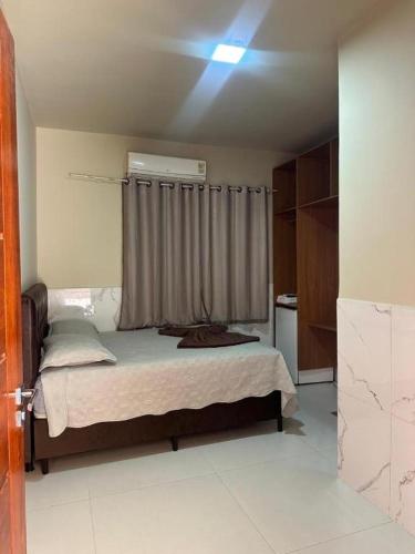 Postel nebo postele na pokoji v ubytování Hotel Rio madeira ao lado do Porto velho shopping