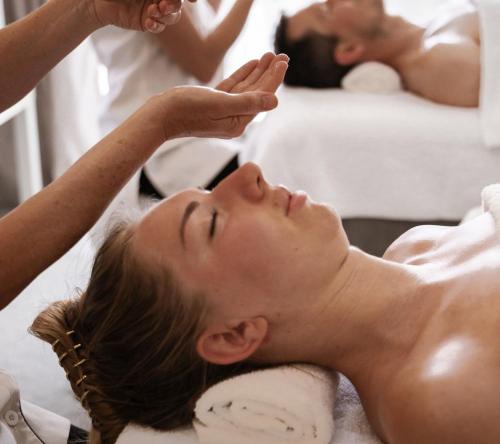 a woman getting her hair washed at a salon at Vibrant Living Retreat in Hanmer Springs
