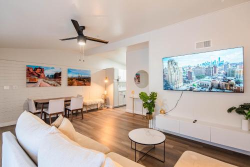 a living room with a couch and a table at Spacious 2 Bedroom, 2 Bath, Pool, Free Parking, Gym in Scottsdale
