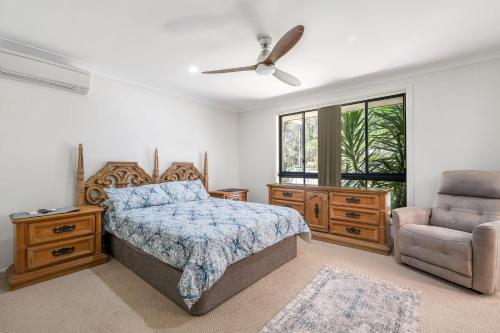 En eller flere senge i et værelse på Lake Cathie Oasis - 32 Bounty Avenue