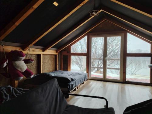 Postel nebo postele na pokoji v ubytování Zmajevo Gnezdo II Water House