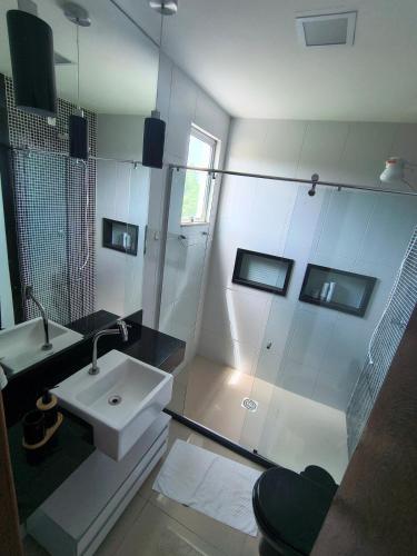 Et badeværelse på Casa espaçosa em Meaipe