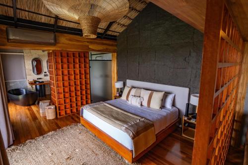 Ένα ή περισσότερα κρεβάτια σε δωμάτιο στο Casa Malva Villas