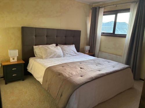 Postel nebo postele na pokoji v ubytování Hostal Mundet