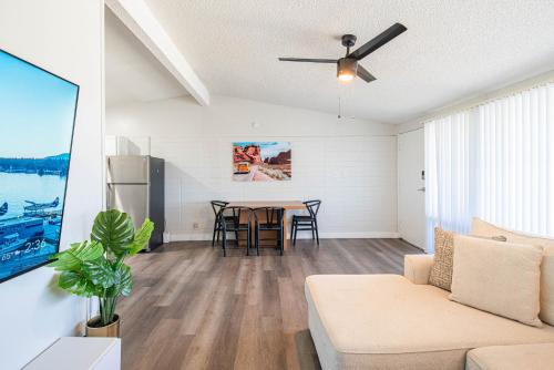 a living room with a couch and a table at Spacious 2 Bedroom, 2 Bath, Pool, Free Parking, Gym in Scottsdale