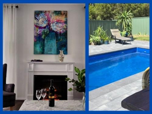 a living room with a painting and a swimming pool at Brand New Home with Pool in Lyndoch