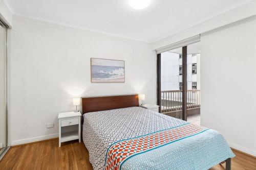 Postel nebo postele na pokoji v ubytování 1-bed flat in CENTRAL Sydney