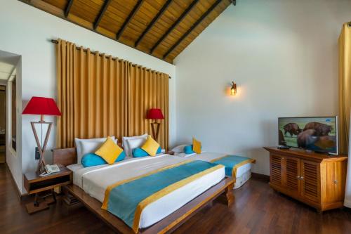 Un pat sau paturi într-o cameră la Grand Beach