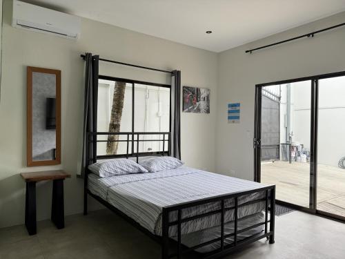 Ένα ή περισσότερα κρεβάτια σε δωμάτιο στο La Casa de Papi.