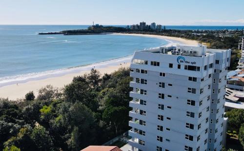 an aerial view of a beach and a building at 84 The Spit Holiday Apartments in Mooloolaba