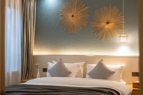 Ένα ή περισσότερα κρεβάτια σε δωμάτιο στο The Tea & Bamboo Retreat A serene homestay offering complimentary bamboo weaving workshops and tea tasting experiences.