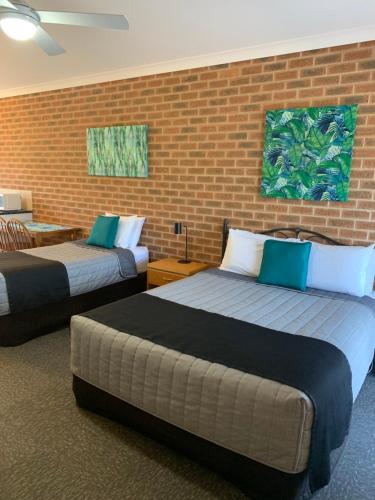 Postel nebo postele na pokoji v ubytování Motel Views Yackandandah