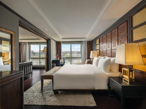 Ένα ή περισσότερα κρεβάτια σε δωμάτιο στο Hanoi Solis Hotel