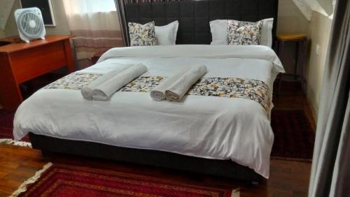 Postel nebo postele na pokoji v ubytování Yukis & Kukis Place 5 Bedrooms