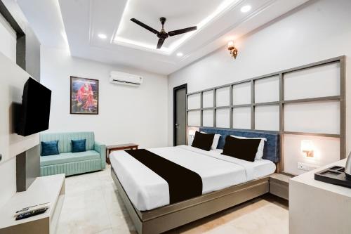 Ένα ή περισσότερα κρεβάτια σε δωμάτιο στο Super Townhouse Jodhpur Clock Tower Formerly Shiv Hari Heritage