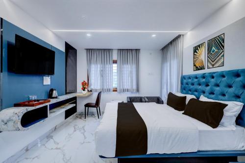 Et tv og/eller underholdning på Townhouse Passport Office Saligramam Formerly K.K Nagar Residency