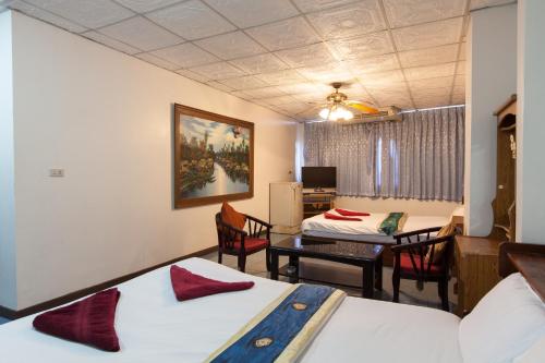 Cama o camas de una habitación en The Encore Hotel