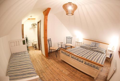 Кровать или кровати в номере Penzion Recall