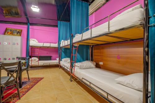 Postel nebo postele na pokoji v ubytování Big Apple Hotel and Hostel