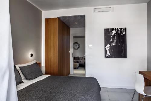 Ένα ή περισσότερα κρεβάτια σε δωμάτιο στο SH Home