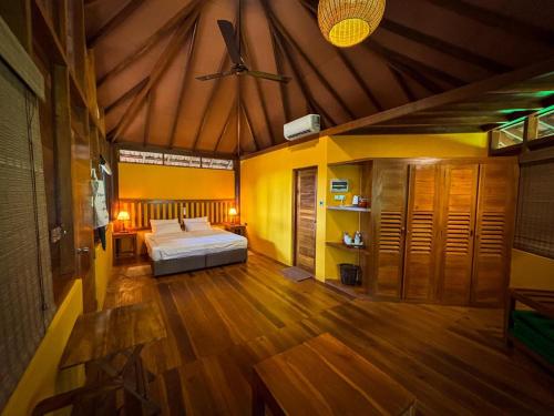 Rúm í herbergi á Palm Paradise Cabanas & Villas Beach Resort