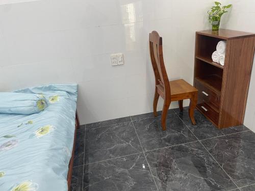 Un ou plusieurs lits dans un hébergement de l'établissement Habi Homestay Doc Let