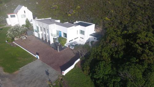 an overhead view of a large white house at Agulhas Ocean House in Agulhas