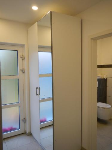 Ванная комната в tolles komfortables Appartement Zaubersee