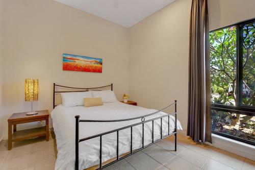 En eller flere senge i et værelse på Little Wallaby Retreat