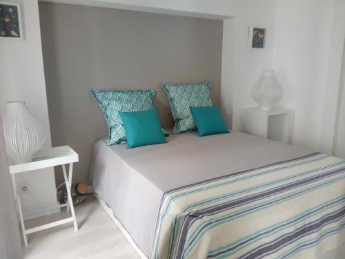 Ένα ή περισσότερα κρεβάτια σε δωμάτιο στο SeaShell Apartment - Sesimbra