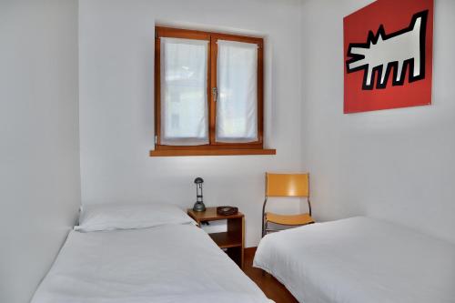 Voodi või voodid majutusasutuse Windshouse Apartments toas