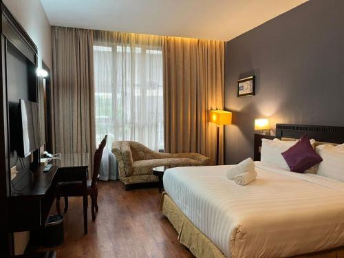 Postel nebo postele na pokoji v ubytování Kingston Hotel 18 - Kuala Lumpur Sri Damansara