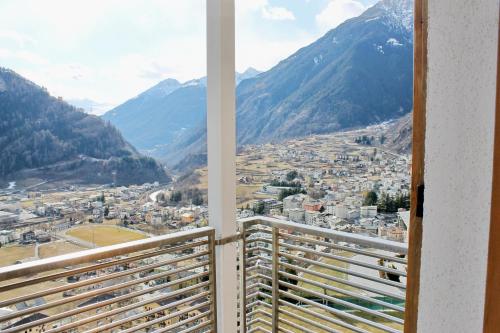a view of a city from a balcony at Hotel Rezia in Sondalo